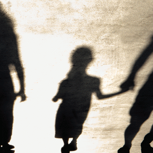 shadow image of a family holding hands