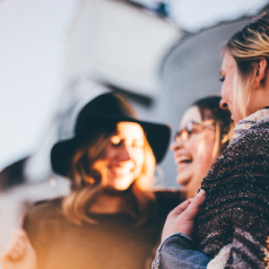 Three women laughing