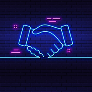 A neon sign of a handshake